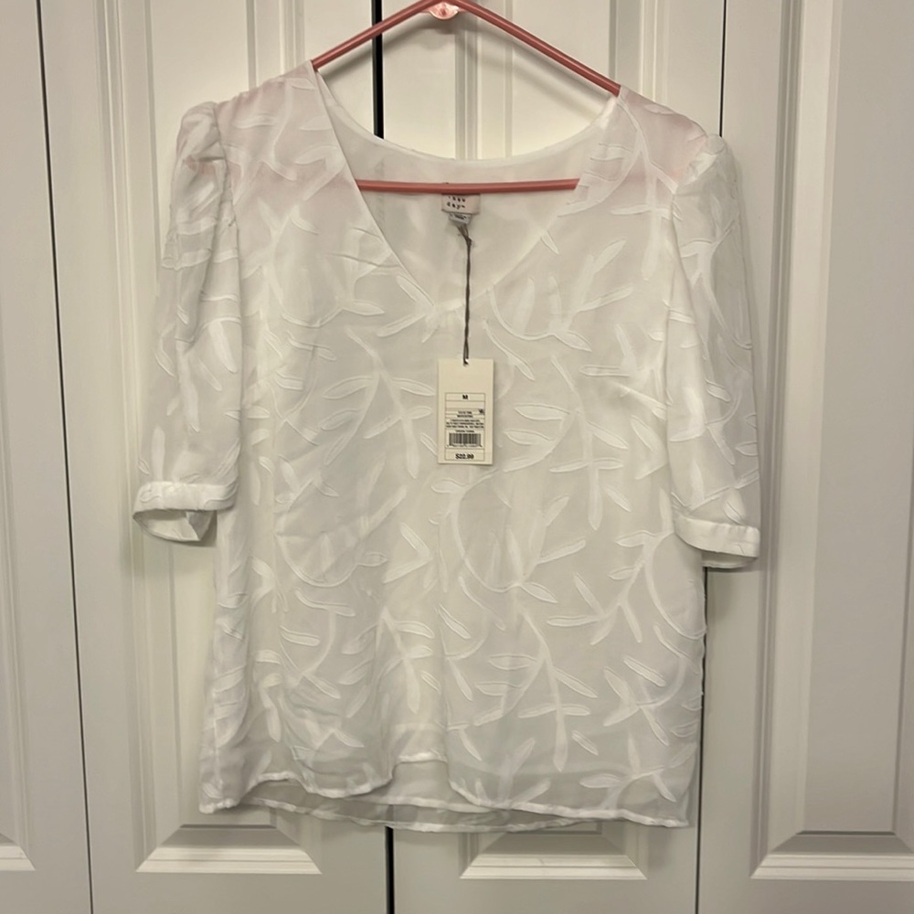A new day blouse. White pattern